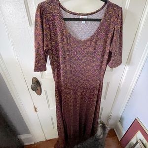 XL LuLaRoe dress. I’m 5’7 and it goes to my feet.